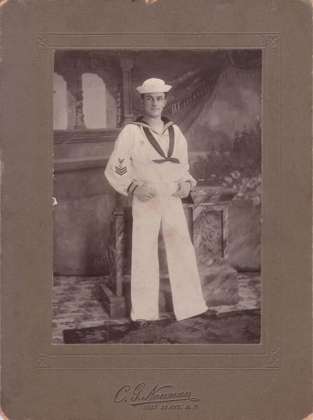 A sepia-toned image of a confident sailor, standing tall with an unmistakable pride.