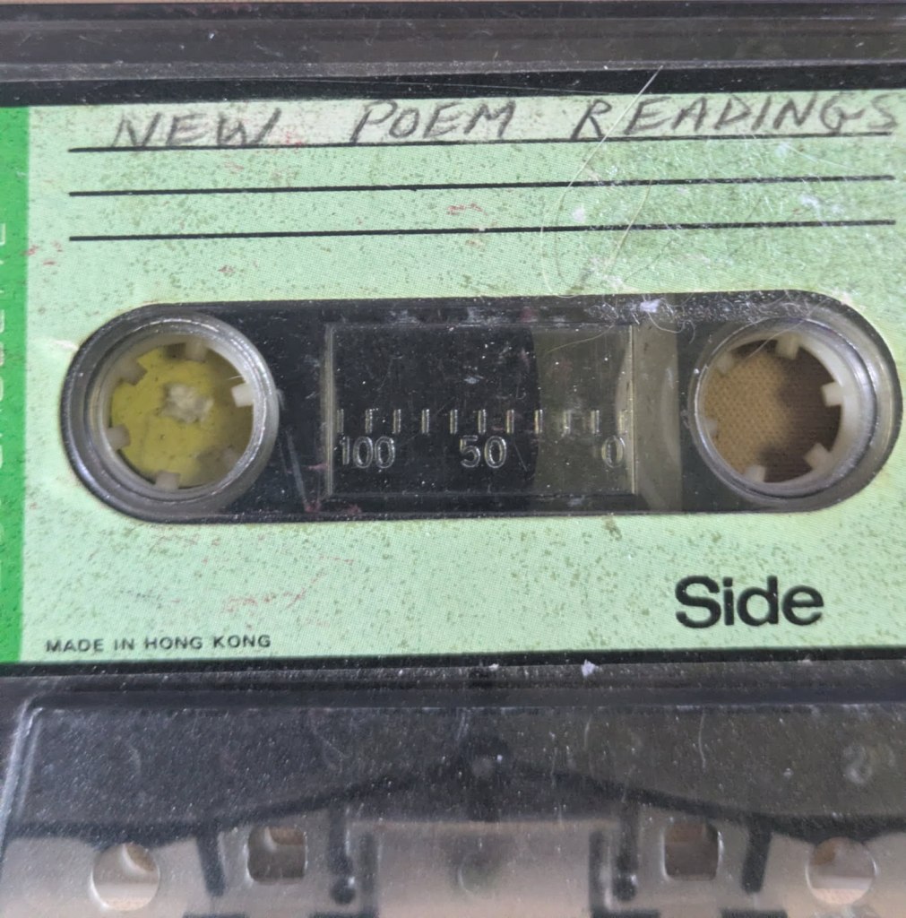 A cassette tape hand-labeled "New poem readings"